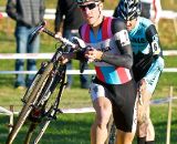 Jeremy Powers leads Ben Berden over the barriers. ©Jeffery Jakucyk