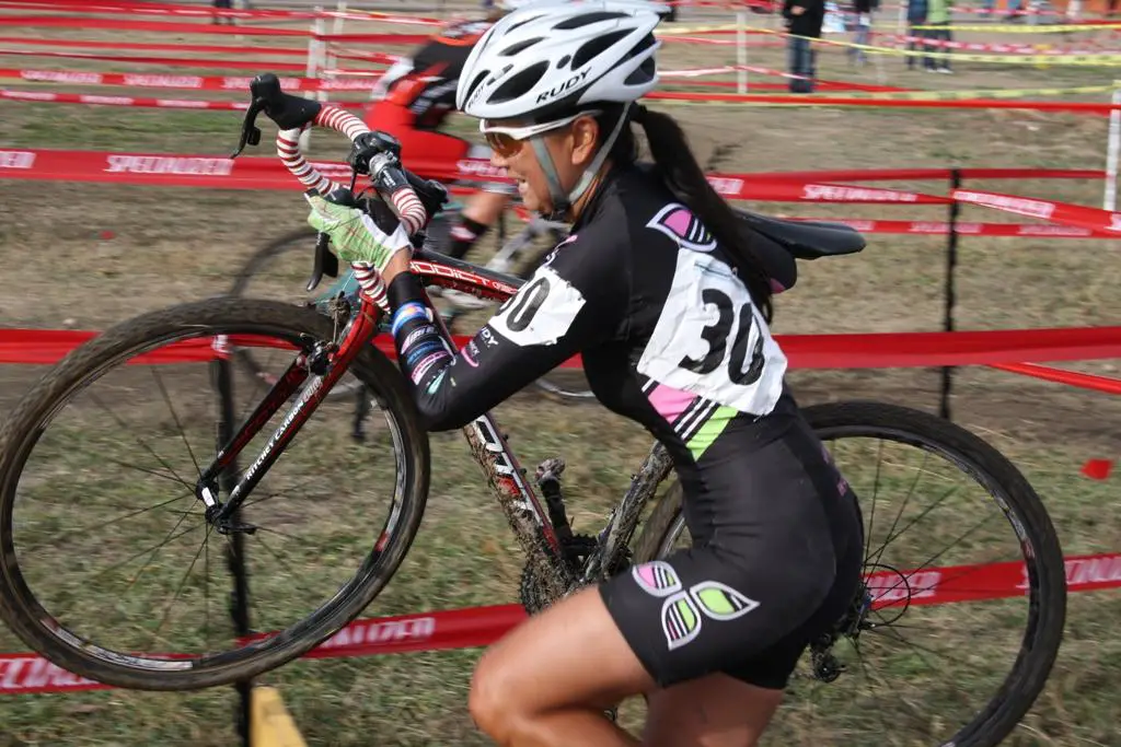 Local tough girl Melanie Long goes over the barriers. © P Guerra