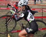 Local tough girl Melanie Long goes over the barriers. © P Guerra