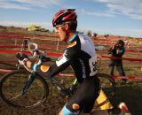 Promoter Aaron Bouplon carrying his bike. © P Guerra