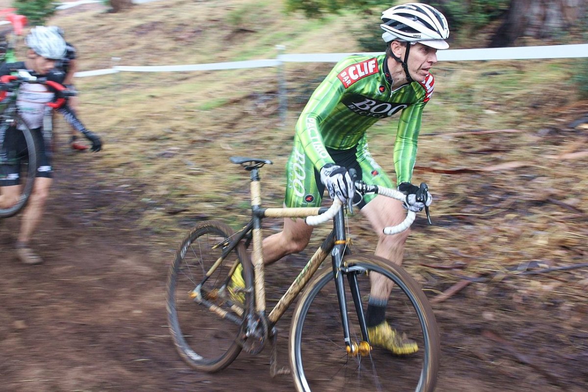 Boo Bicycles\' Troy Evans pushes his bamboo singlespeed up the climb. © Cyclocross Magazine