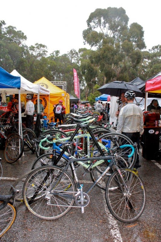 The team area was bustling with tents and pit bikes. © Jon Suzuki