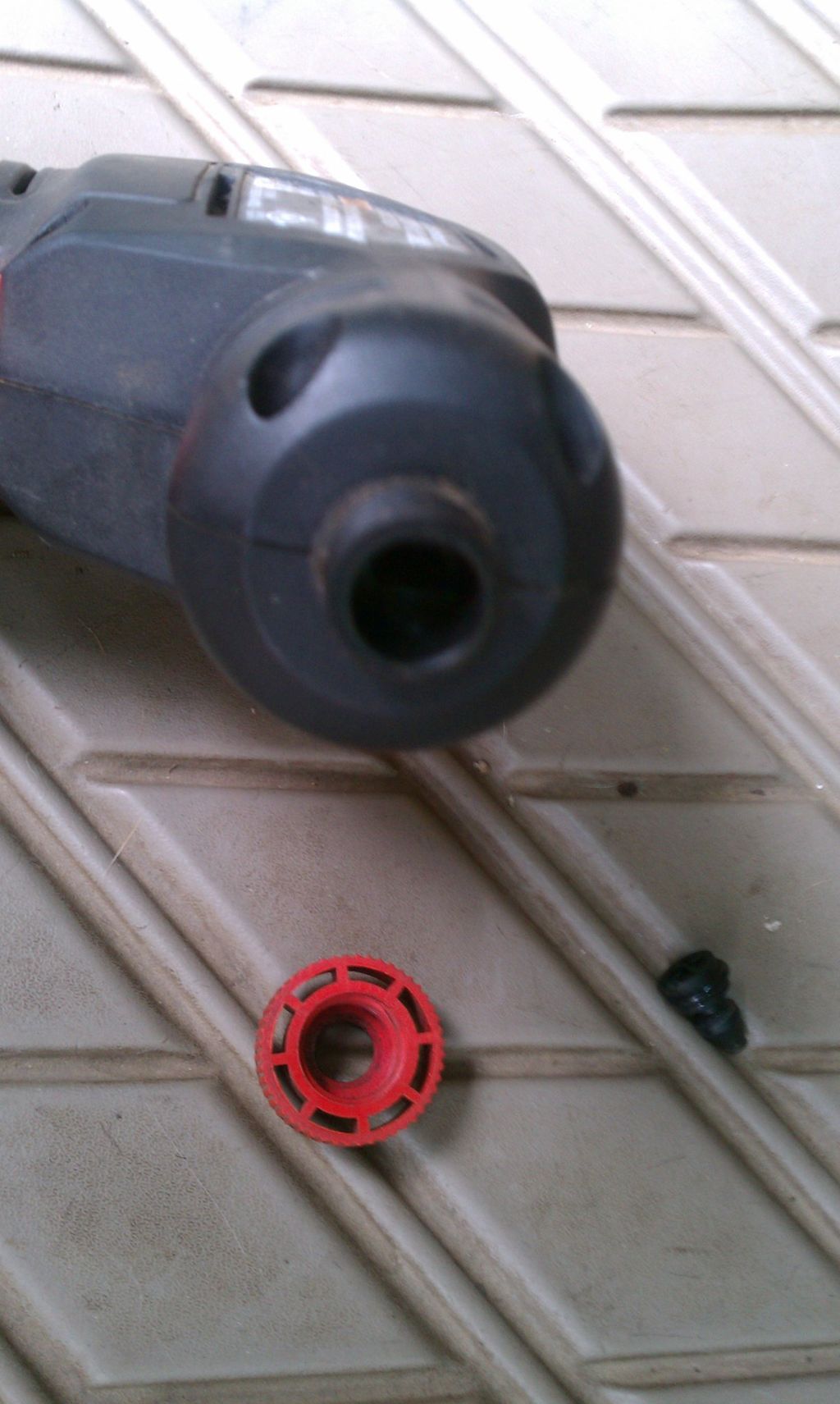 step-three-remove-the-red-knob-from-the-inflator-and-remove-the-chuck-that-is-in-there