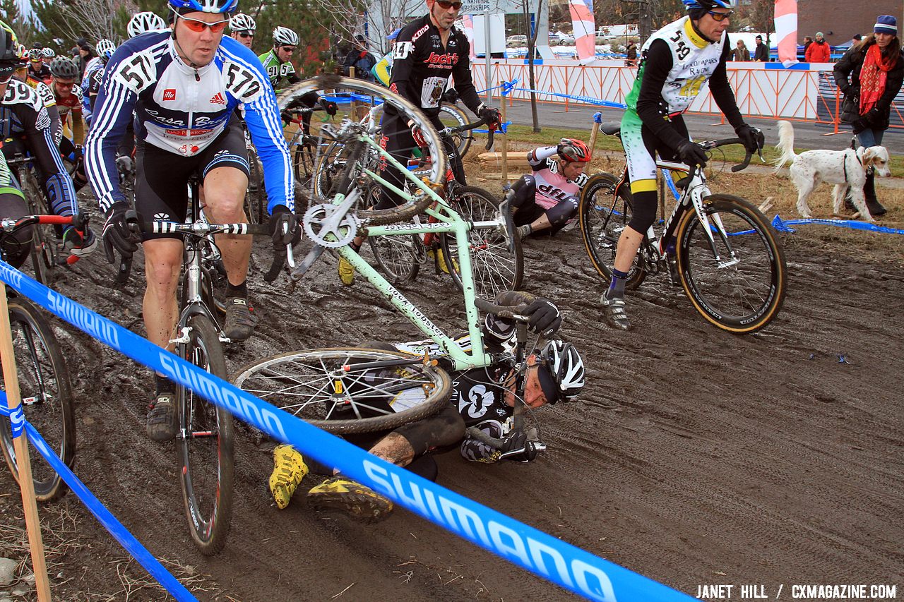 The first time through the mud behind the announcers\' booth was a popular pile-up spot © Janet Hill