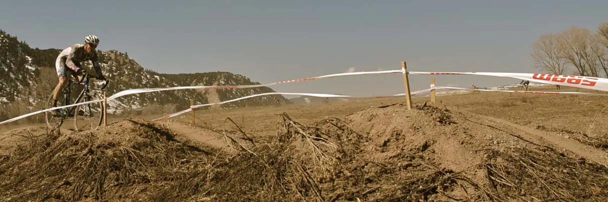 Courtney Gregory battles the winds across the Pump Track. by Karen Jarchow