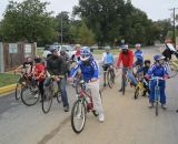 Some attendees from the special olympics prepare to tackle a lap with some riding buddies