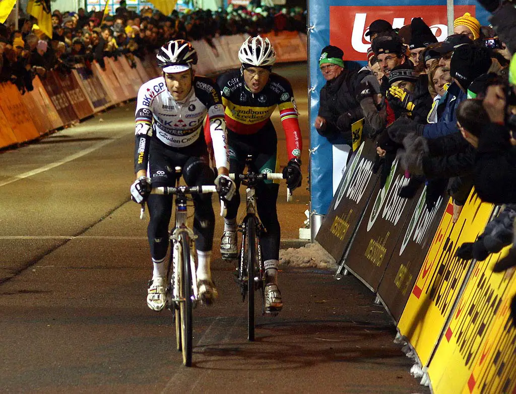 Niels Albert and Sven Nys get the bell in Diegem ©Dan Seaton