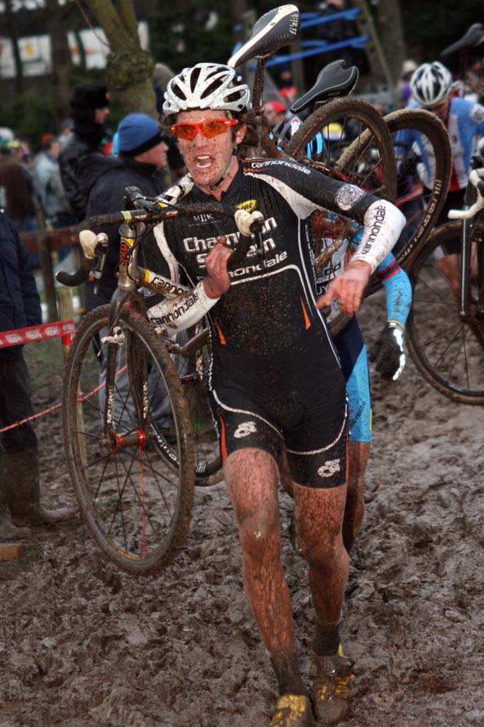 Travis Livermon treks through the Belgian mud. ? Bart Hazen
