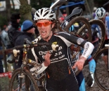 Travis Livermon treks through the Belgian mud. ? Bart Hazen