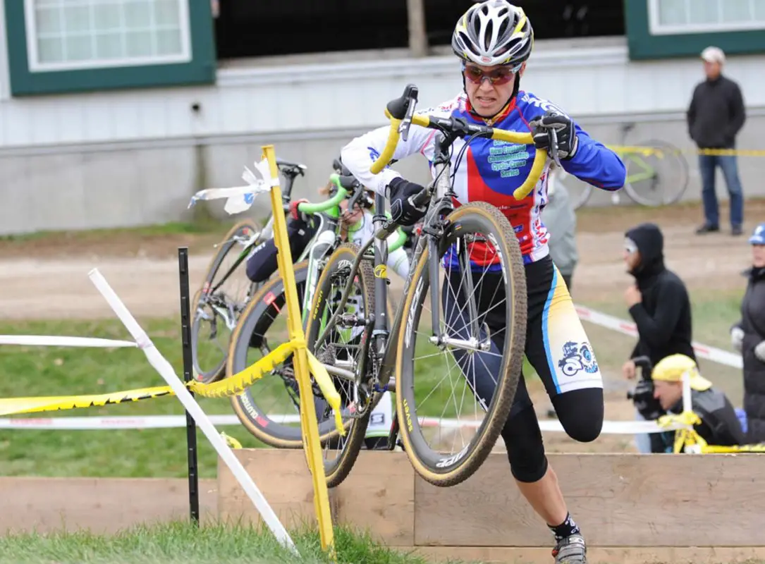 Andrea Smith (Ladies First Racing) through the barriers© Natalia Boltukhova | Pedal Power Photography