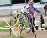 Andrea Smith (Ladies First Racing) through the barriers© Natalia Boltukhova | Pedal Power Photography