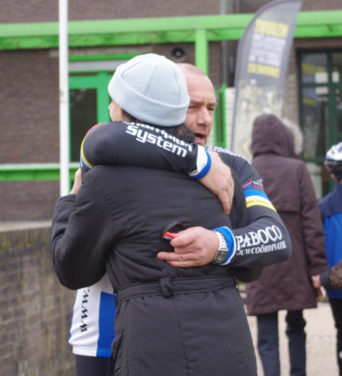 Christine hugging five-time World Champ Roland Liboton. ? Jonas Bruffaerts