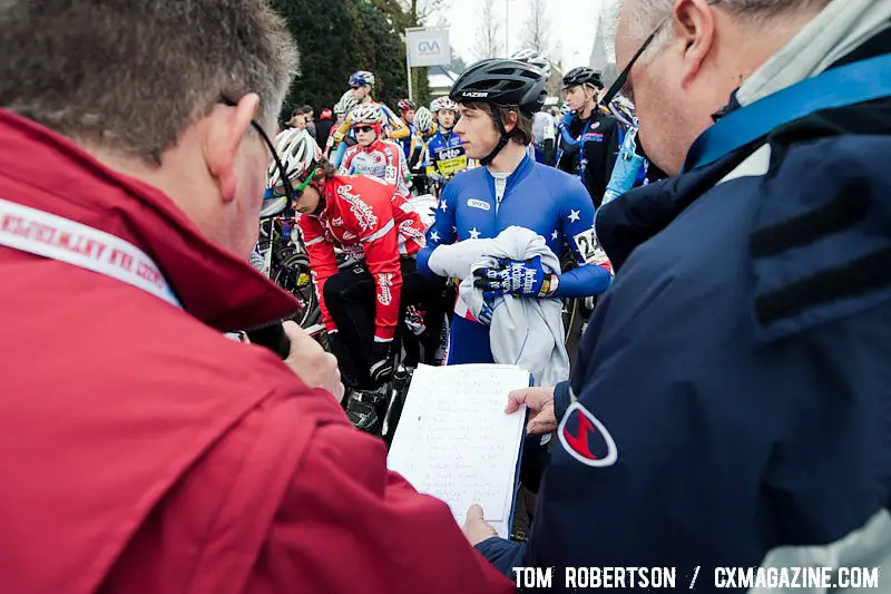 Bahson unveils the national championship jersey while race officials check in riders. © Tom Robertson