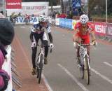 Zach McDonald passing a rider. Euro Cross Camp Day 4- Azencross in Loenhout. ? Nathan Phillips