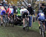 The women's field charges up a hill on the championship course. © Bart Hazen