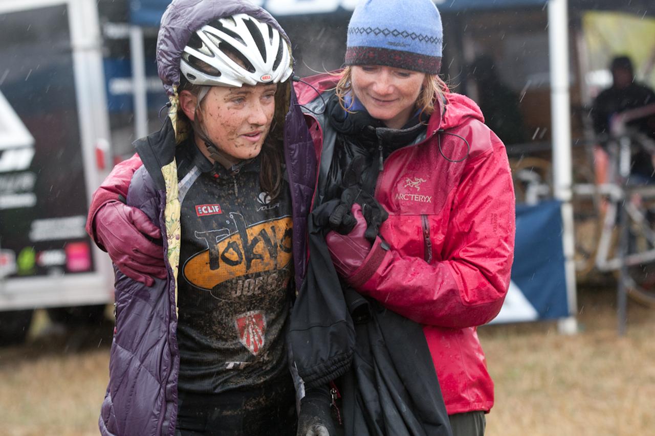 One very cold and muddy rider huddles for warmth. © Wil Matthews 