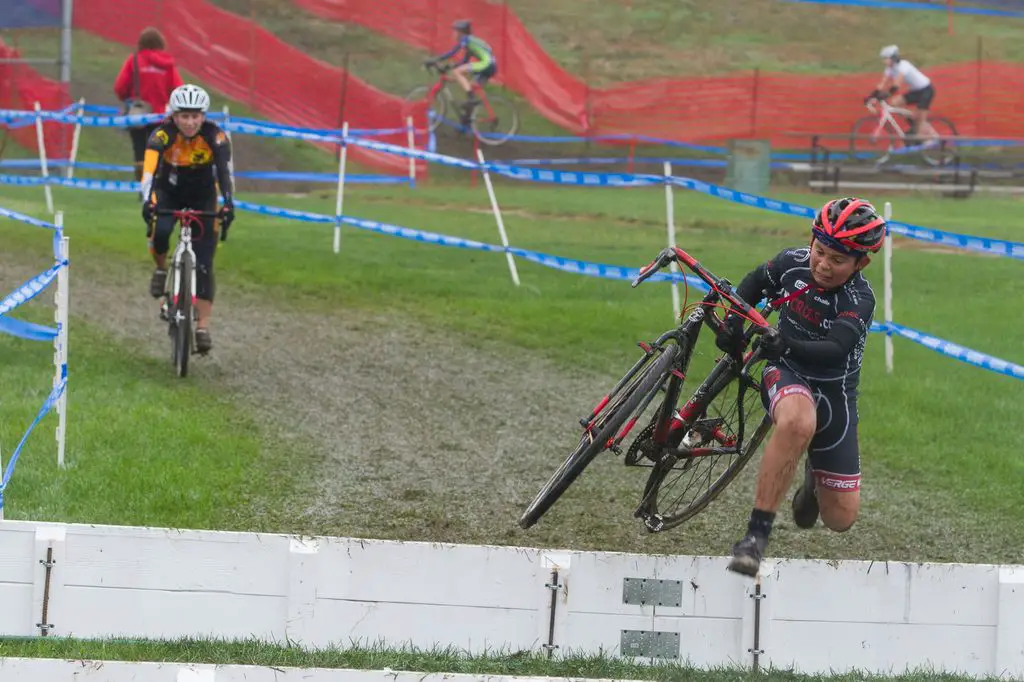 A youngster jumping over the barriers © Todd Prekaski