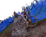 Natasha Elliott runs the muddy turn. ? Paul Weiss