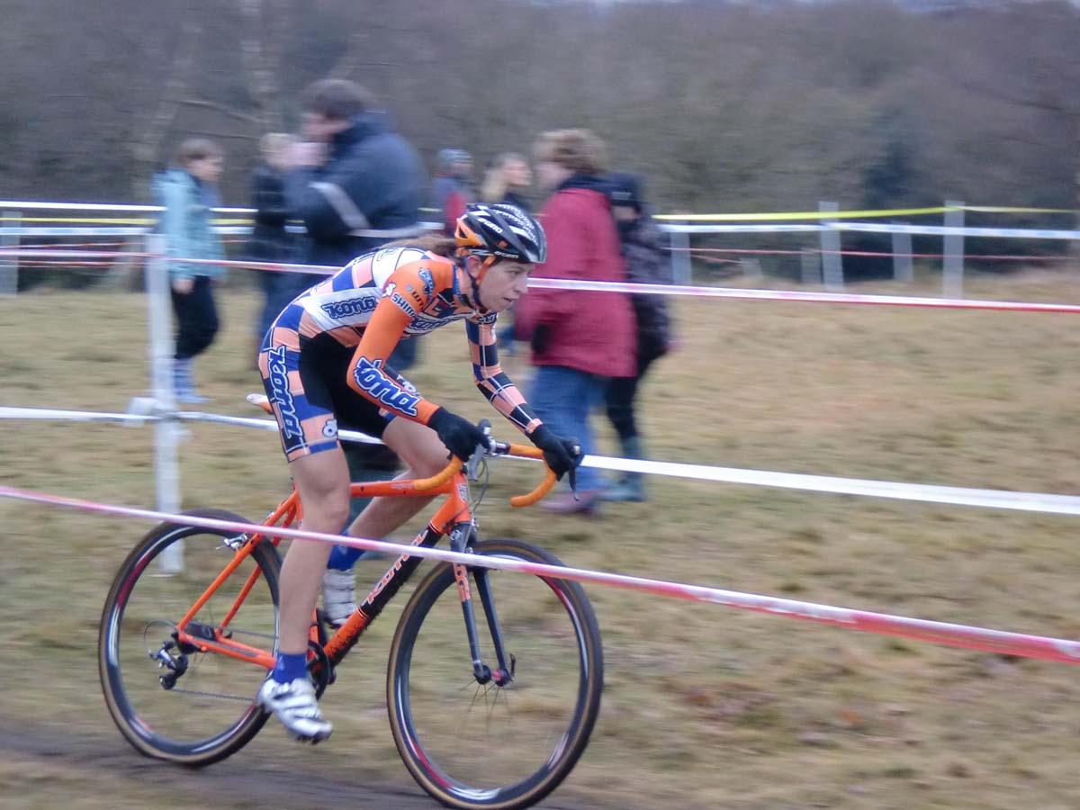 Wyman racing in orange at the British National Championships. Photo Courtesy Helen Wyman