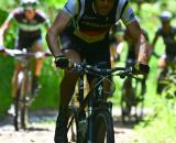 Garth Prosser (Specialized) leads the race through a muddy section of West Virginia state road. Pathfinder WV provided some of the local flavor to the race via a bacon station for finishers. © Fred Jordan