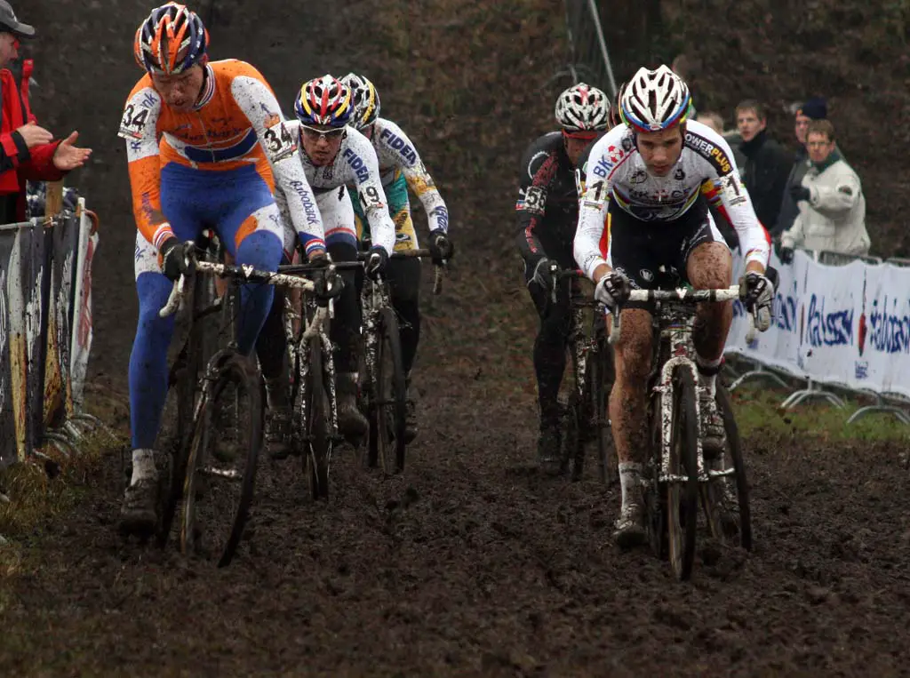 The lead group fights to keep momentum in the mud. ? Bart Hazen