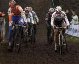 The lead group fights to keep momentum in the mud. ? Bart Hazen