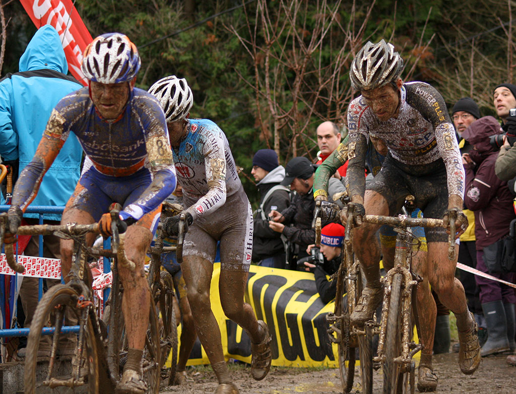 Belgium\'s Bart Aernouts and Niels Albert are already muddy on the first lap © Cyclocross Magazine