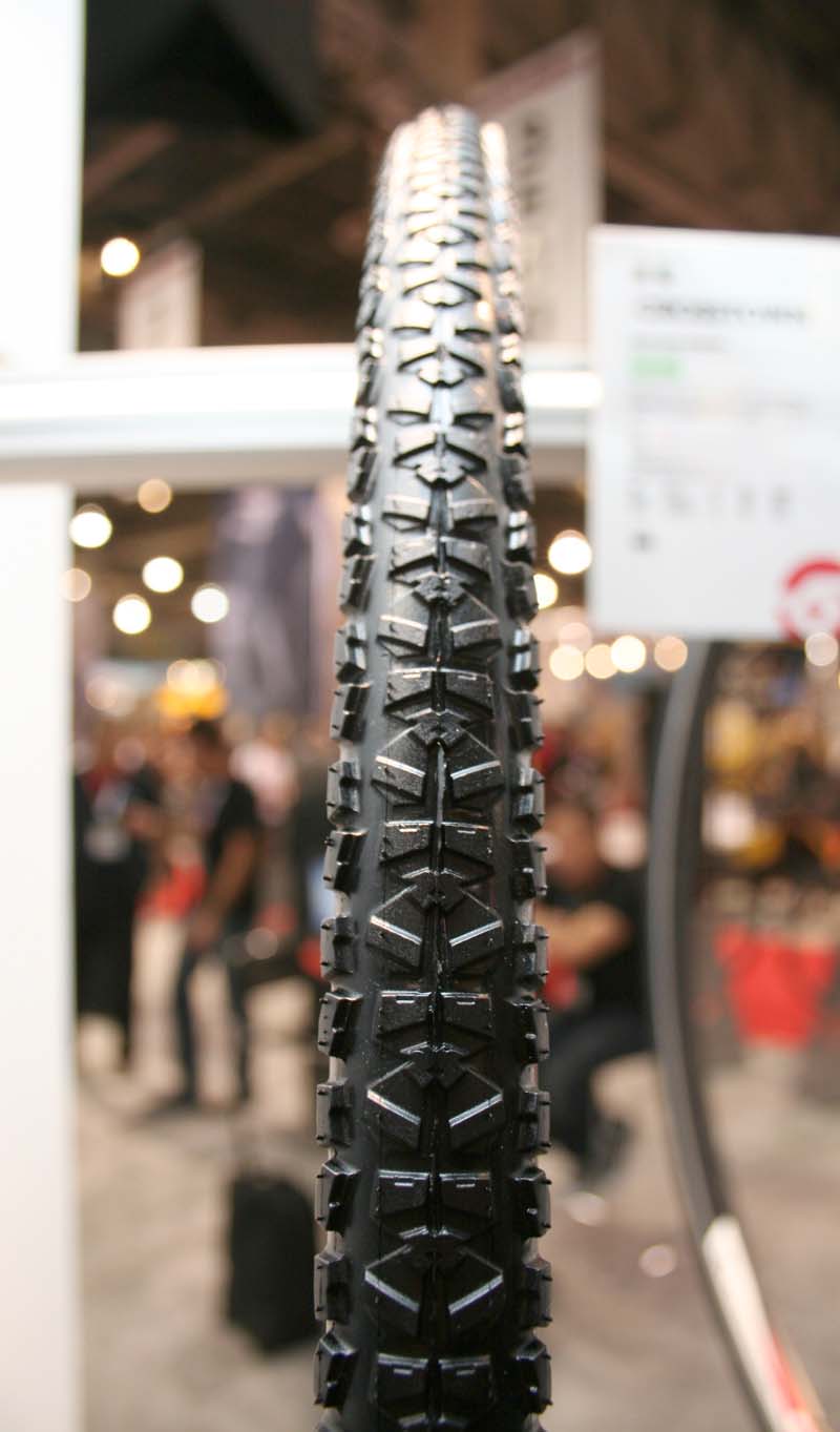 Hutchinson has a Crosstown tire, designed for commuters and cyclocross training. This Pirannha-like treaded tires is 650 grams at 32c.