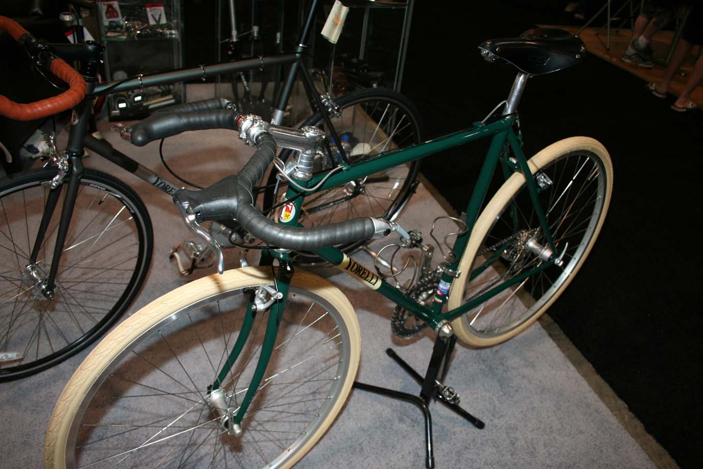 This green model was built commuter-style with mustache bars and fat road tires. ?Cyclocross Magazine