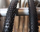 The Slant Six (left) offers aggressive traction while the Happy Medium (right) is a semi-slick with aggressive cornering. © Cyclocross Magazine