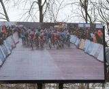 Watching the big screen while at the race at the Elite World Championships of Cyclocross. © Janet Hill