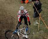  Evan Guthrie (Rocky Mountain) retrieving his bike after coming off it on one of the slippery downhills.
