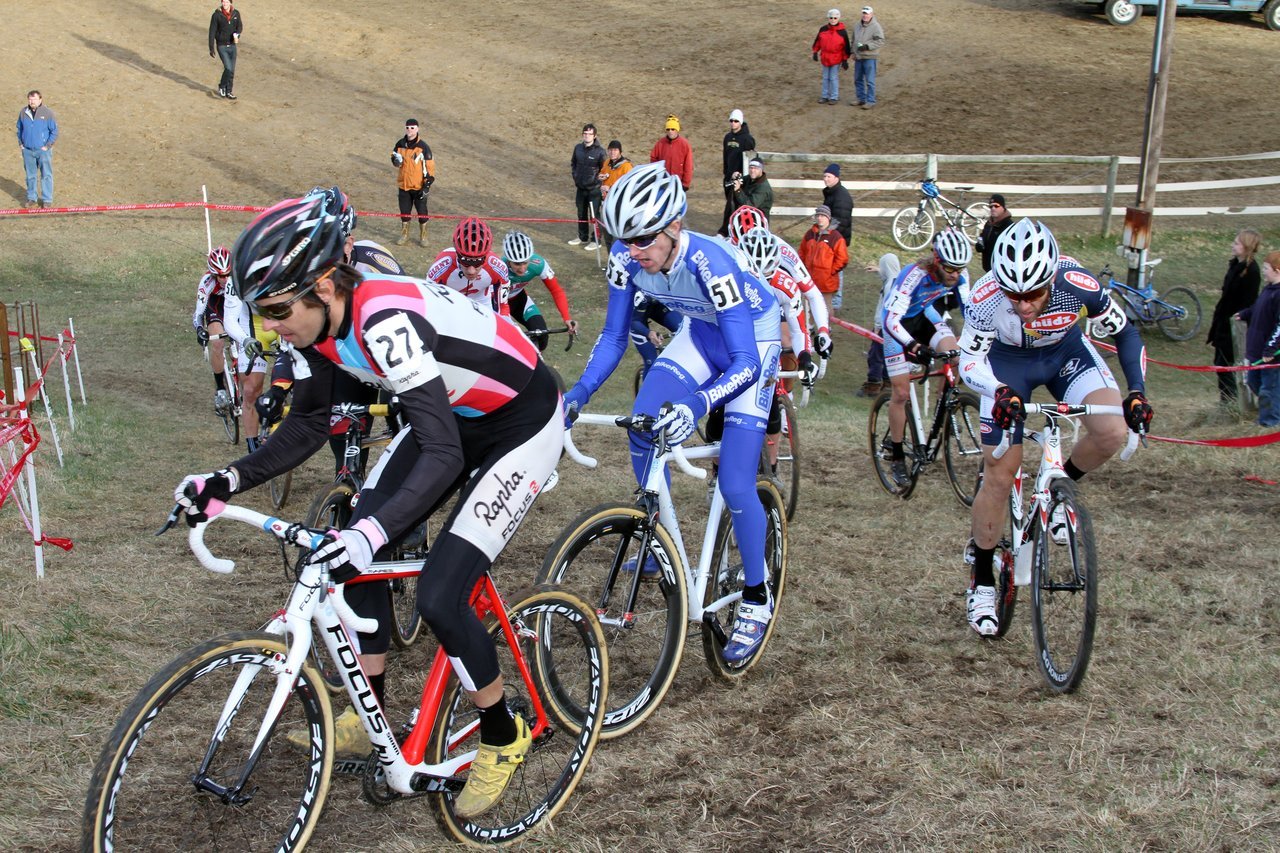 Everyone was trying to squeeze into the corner coming off the first climb on Lap 1. Jingle Cross 2010 Day 3. © Amy Dykema