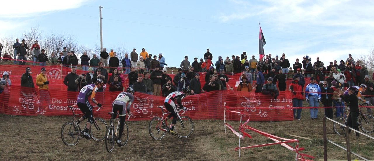 An enthusiastic crowd watches Trebon (right), Jones, Schouten and Wicks on the first climb next to the grandstands. Jingle Cross 2010 Day 3. © Amy Dykema
