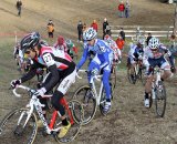 Everyone was trying to squeeze into the corner coming off the first climb on Lap 1. Jingle Cross 2010 Day 3. © Amy Dykema