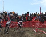 An enthusiastic crowd watches Trebon (right), Jones, Schouten and Wicks on the first climb next to the grandstands. Jingle Cross 2010 Day 3. © Amy Dykema