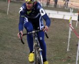 Mike Sherer eyes the hill after coming through the barriers. Jingle Cross 2010 Day 3. © Amy Dykema