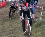 Matter is watching McDonald go through the turn.  Jingle Cross 2010 Day 3. © Amy Dykema