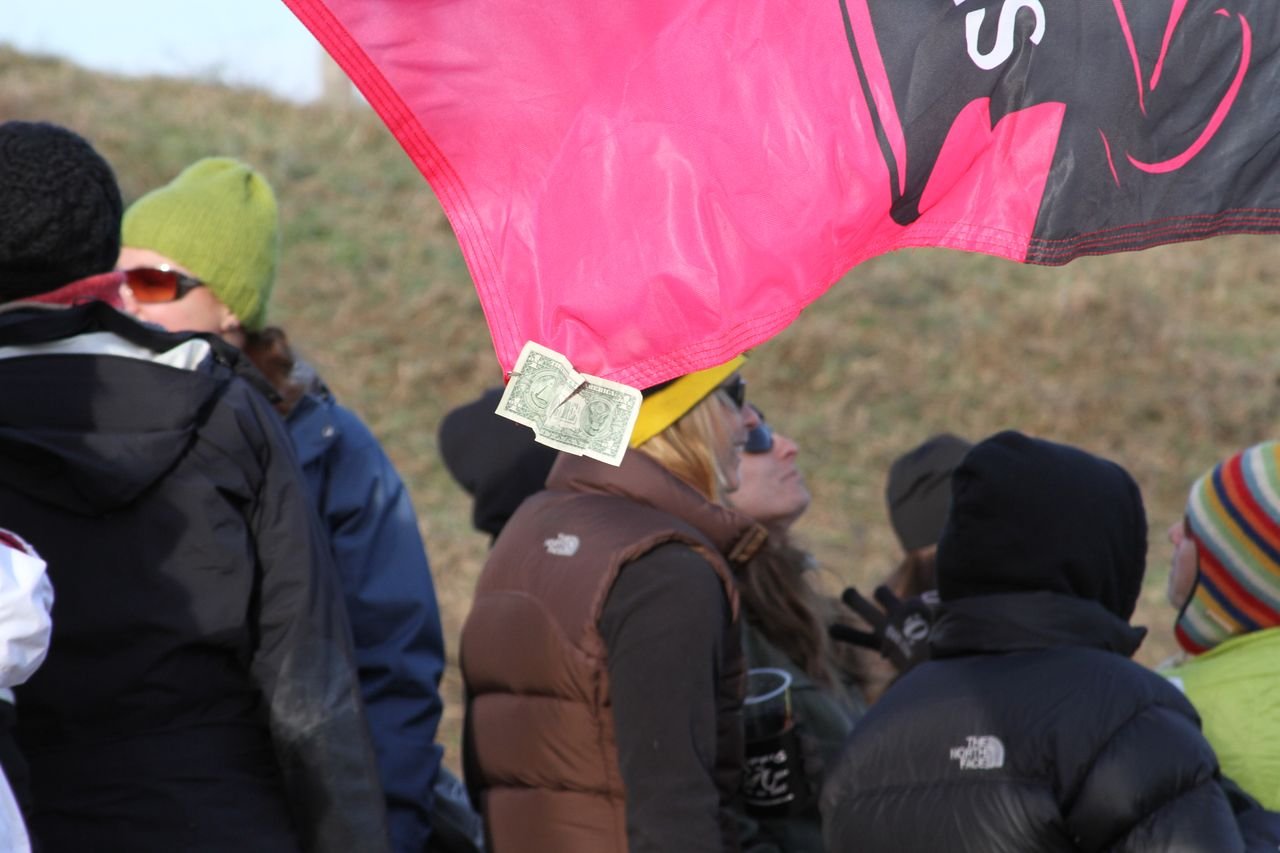 Even the Team Pegasus flag had a dollar bill on it. © Amy Dykema