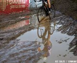 Adam Craig hits the mud on the first lap of the singlespeed race.  © Joe Sales