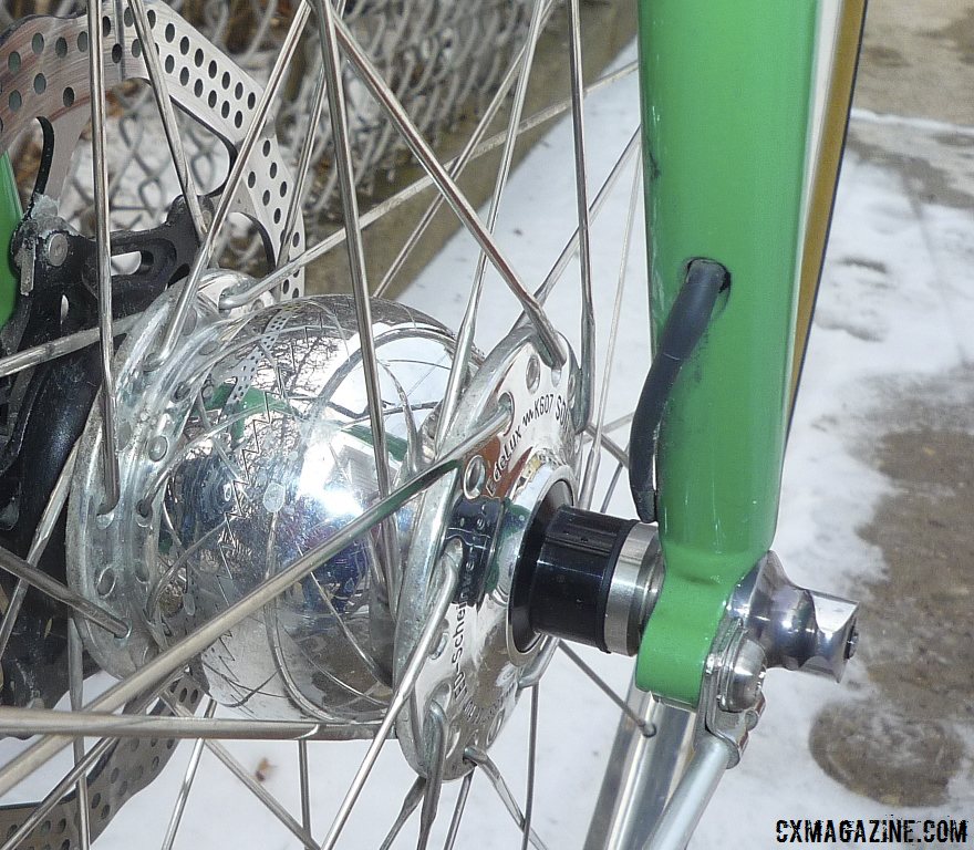 Wilfried Schmidt Maschinenbau dyno disc brake front hub keeps McCarthy pedaling home in the light, without ever needing a recharge. Internal wiring on the Walt Works fork.