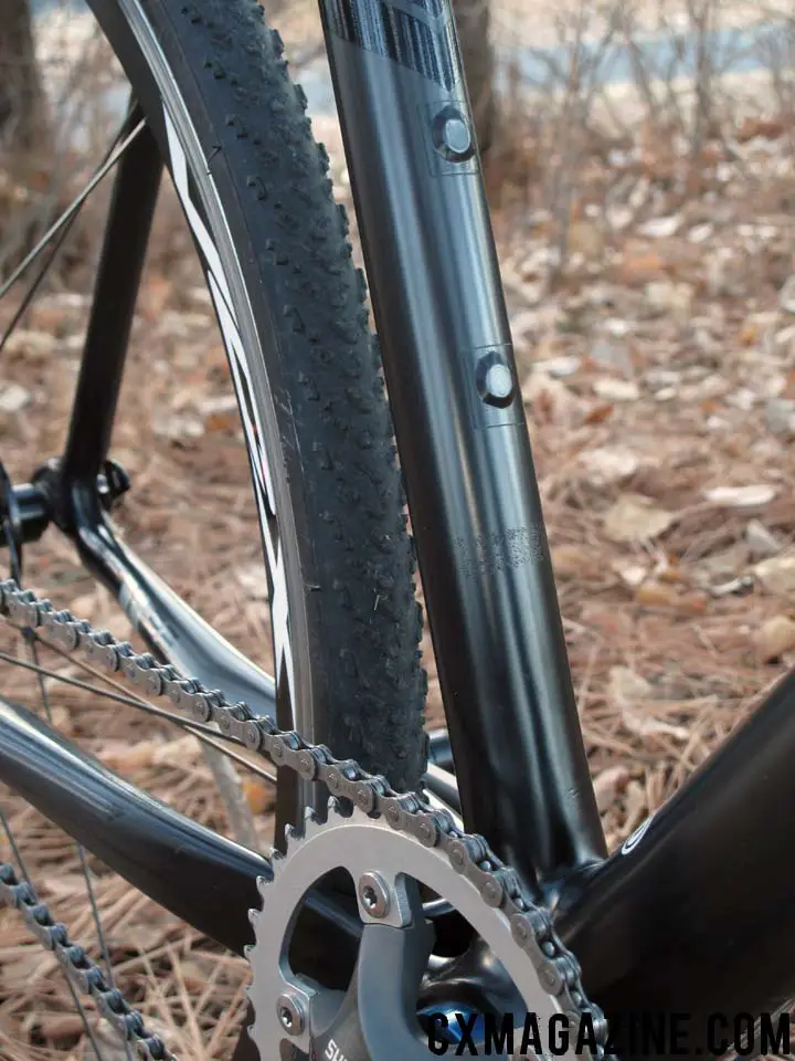 Bottle cage mounts are covered with electrical tape rather than bolts which could snag when shouldering.