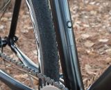 Bottle cage mounts are covered with electrical tape rather than bolts which could snag when shouldering.