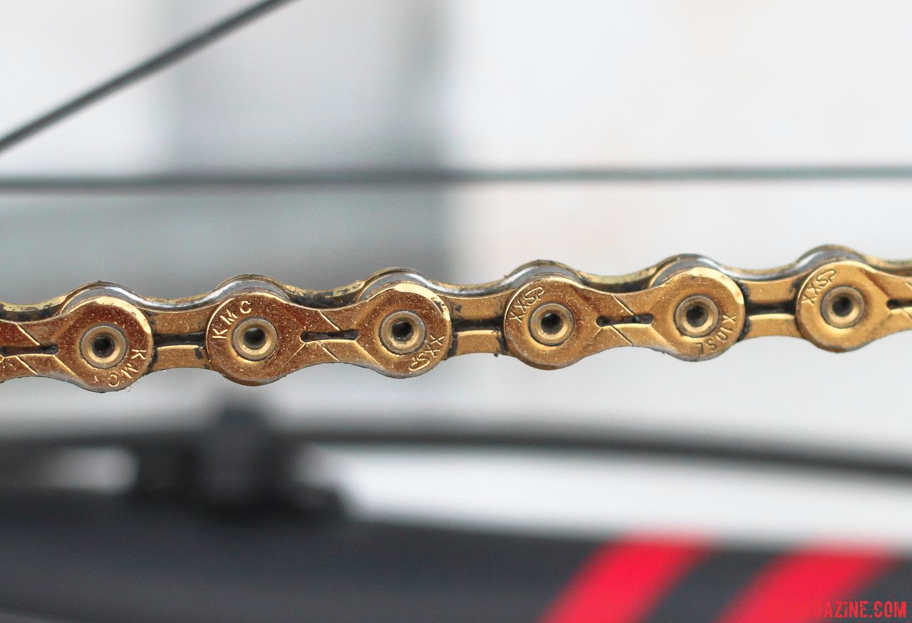KMC\'s X10SL Gold chain for extra flair and a few gram savings (due to hollow plates and pins). © Cyclocross Magazine