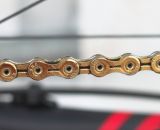 KMC's X10SL Gold chain for extra flair and a few gram savings (due to hollow plates and pins). © Cyclocross Magazine
