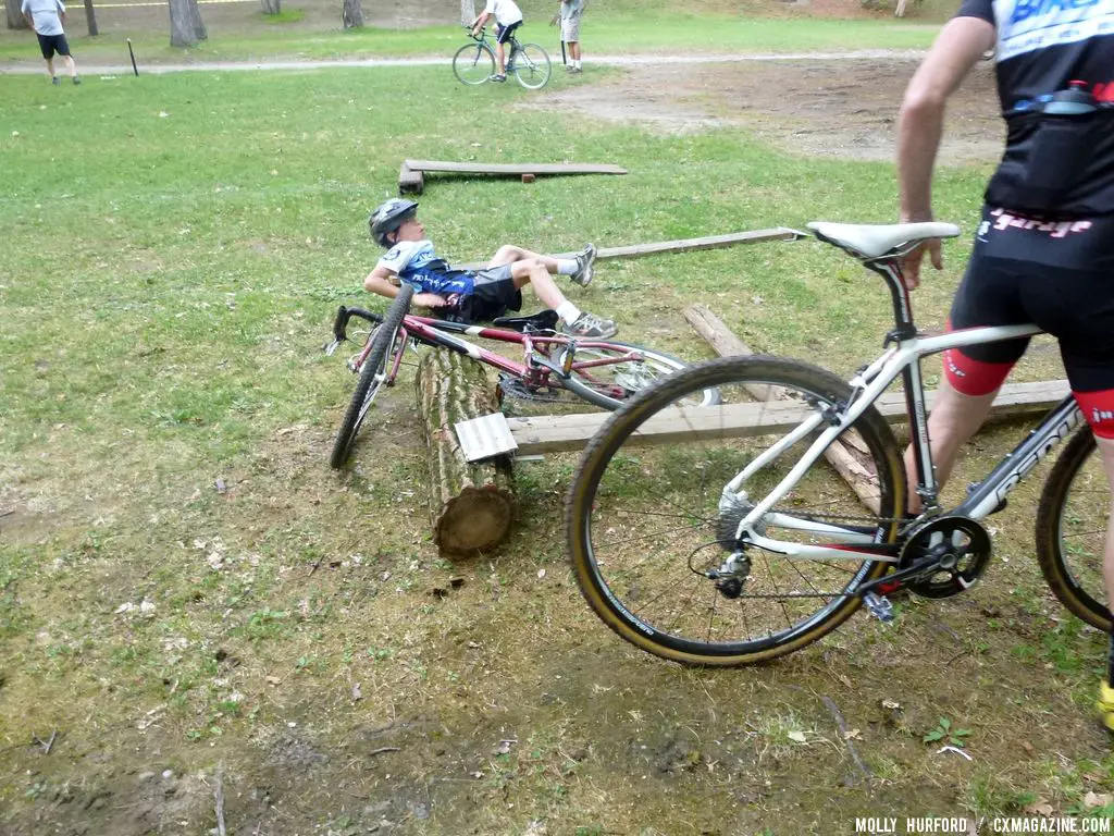 A racer goes down attempting the highest board © Cyclocross Magazine