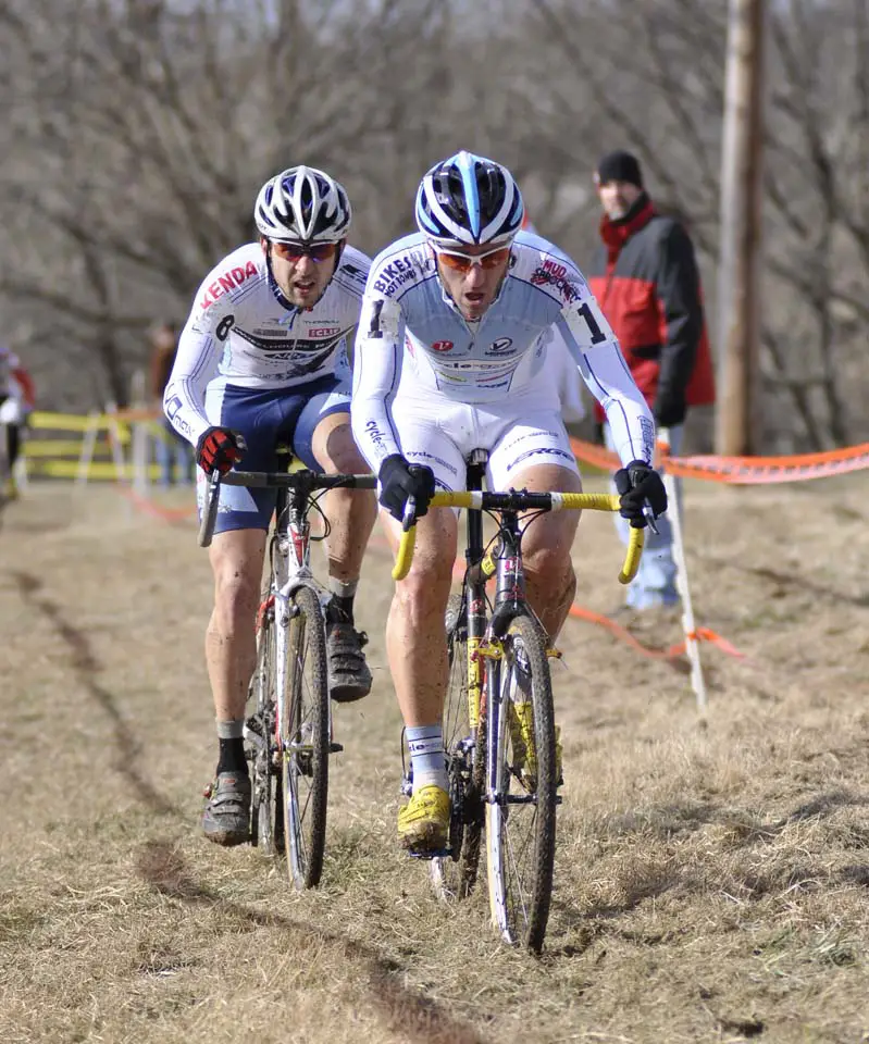 Adam Myerson leads Alec Donahue through the grass © Bart Nave