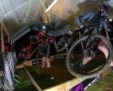 Riders tackle the barriers through the beer tent