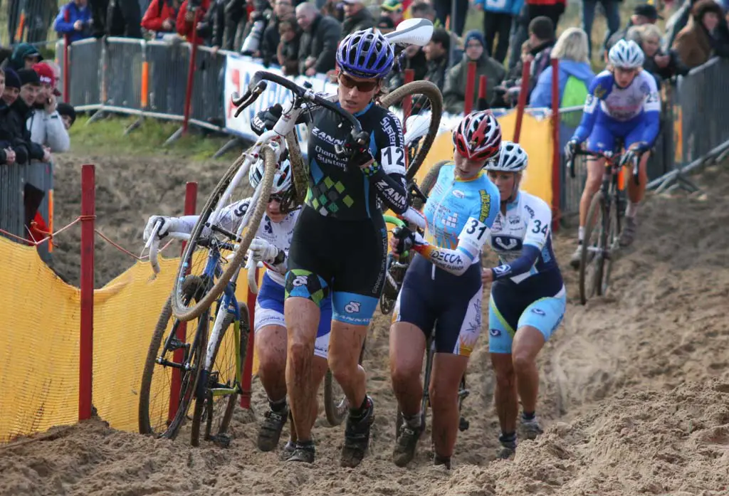 CXM\'s Christine Vardaros leads a group through the sand. ?Bart Hazen