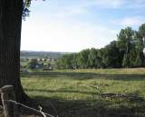 The untainted field. It's hard to tell there have been many battles fought on this grassy spot. We are looking at the top of the descent.  by Christine Vardaros  